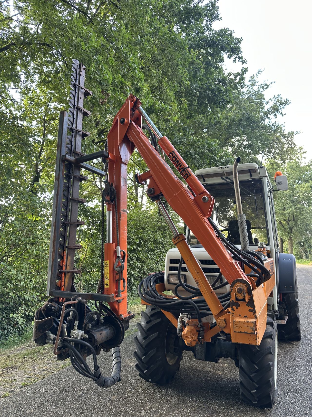 Steyr 8075 AS Smalspoor met maaiarm