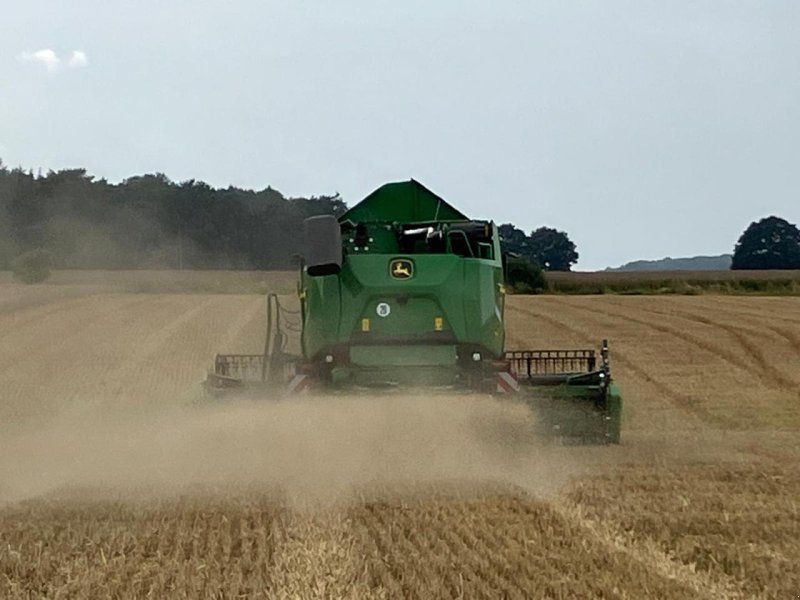John Deere T5 400 + 6,70m Vario-Schneidwerk