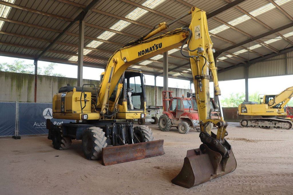 Wheel excavator Komatsu PW140-7 Diesel 32.5kW 2008