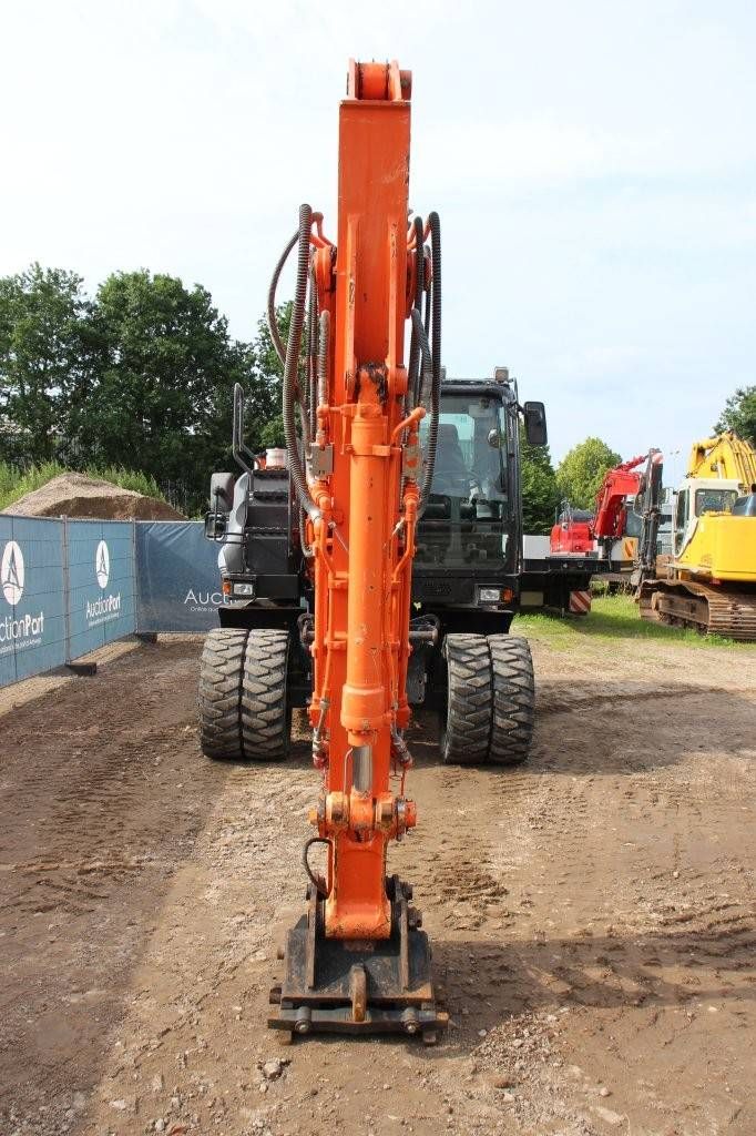 Wheel excavator Hitachi ZX140W-5B Diesel 2016