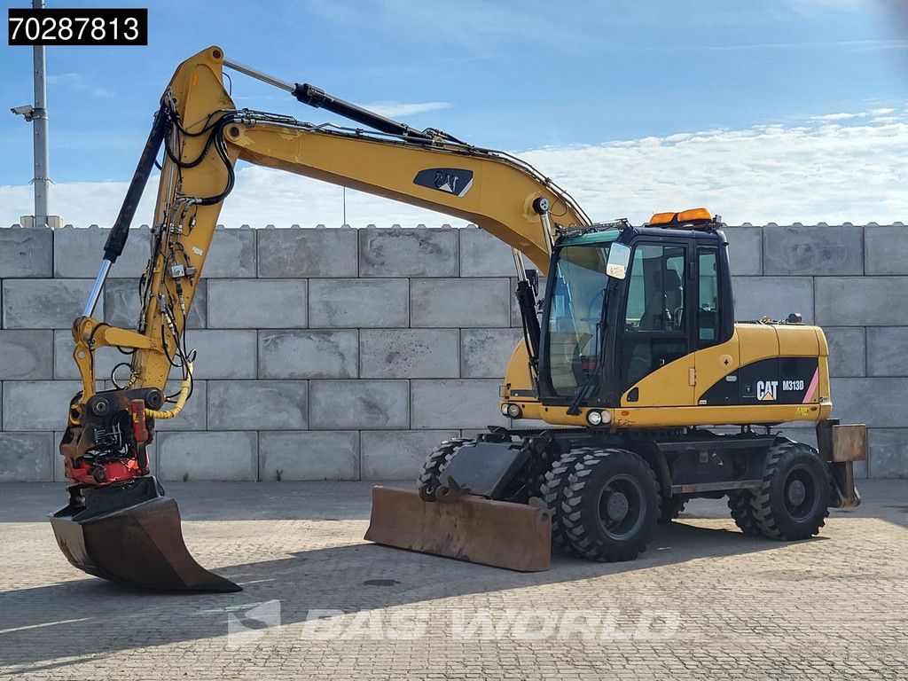 Caterpillar M313 D OUTRIGGERS + BLADE