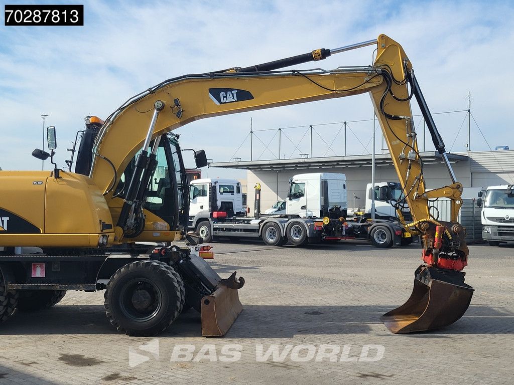 Caterpillar M313 D OUTRIGGERS + BLADE