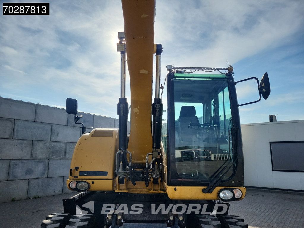 Caterpillar M313 D OUTRIGGERS + BLADE