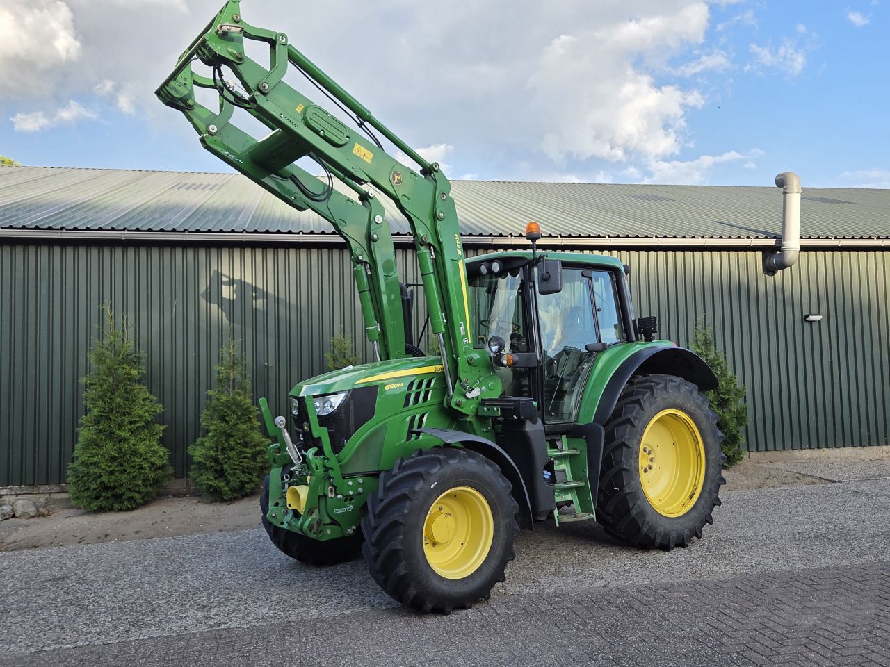 John Deere 6120M + 643R voorlader