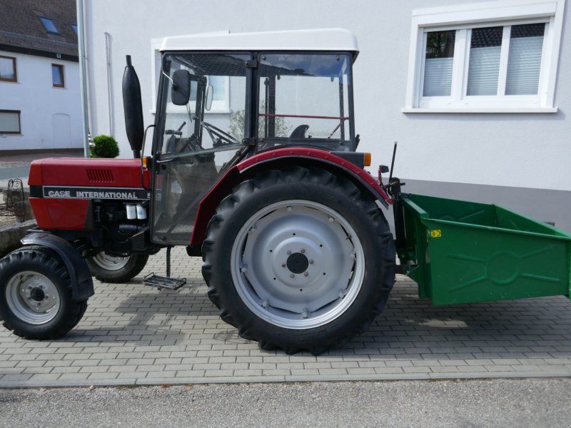 Case IH 533S mit Servolenkung und Heckcontainer. Im Original sehr gutem