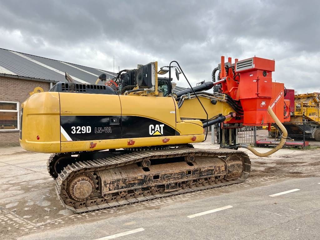 CAT 329D + Wimmer Jura Luna 3.100 Surface Drill Rig