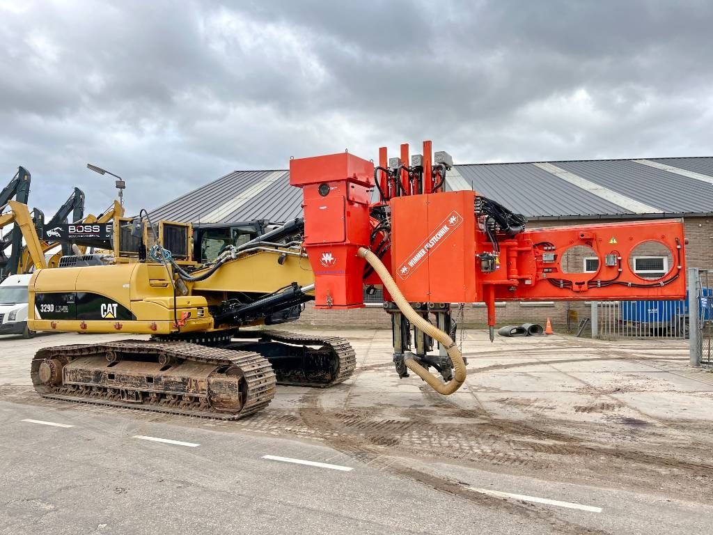 CAT 329D + Wimmer Jura Luna 3.100 Surface Drill Rig