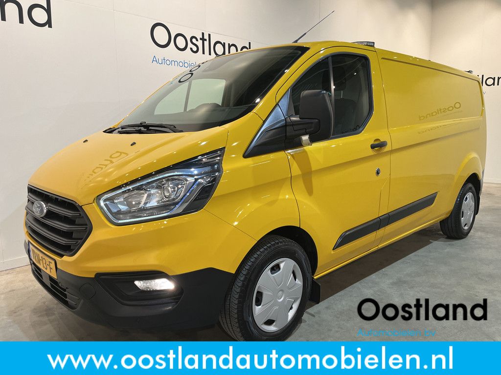 Ford Transit Custom 320 2.0 TDCI L2H1 Trend / Euro 6 / Airco / Cruise Control / Trekhaak / 220 V. / PDC / 65.600 KM !!