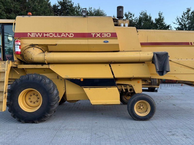 New Holland TX30 SLH + 13” skærebord