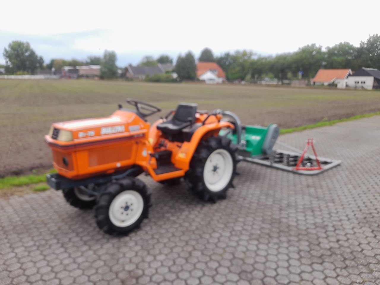 Kubota Bulltra B1-15 minitractor met maaier en weidesleep