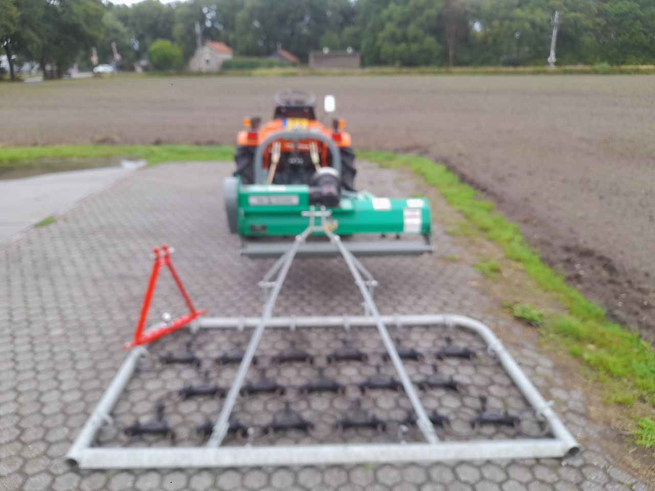 Kubota Bulltra B1-15 minitractor met maaier en weidesleep