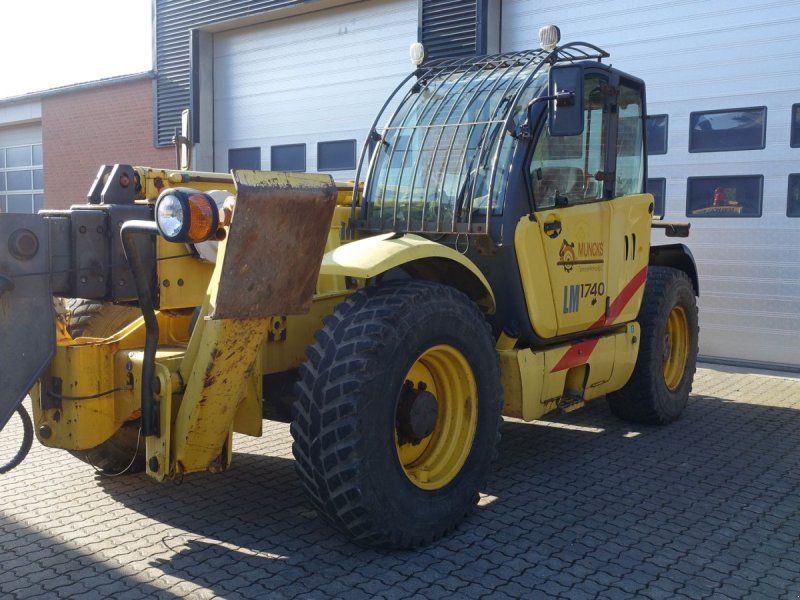 New Holland LM1740 // MED GAFLER, KURV OG FJERNBETJENING