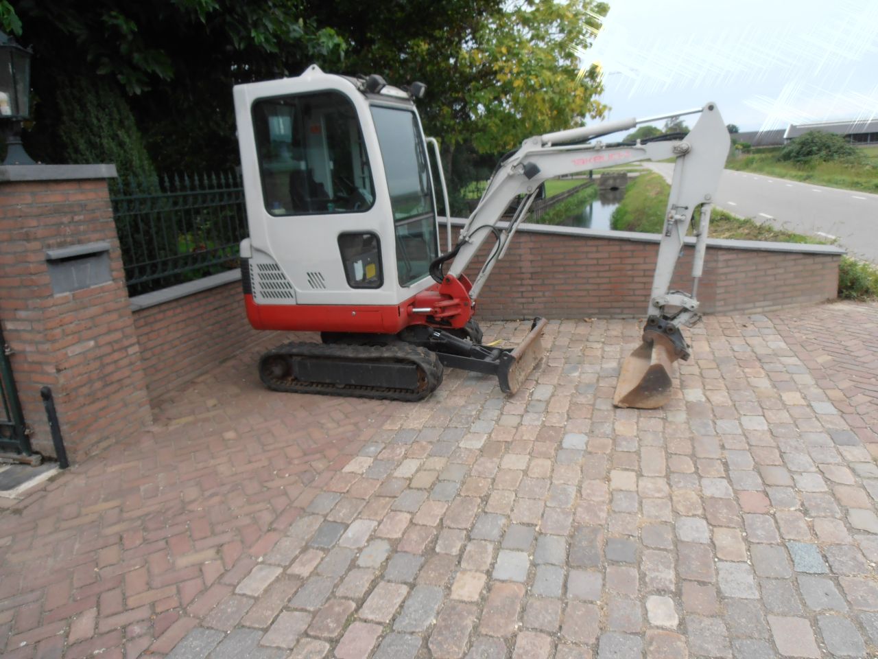 Minigraver Takeuchi Bj 2008 5060 uren zeer mooi en goed