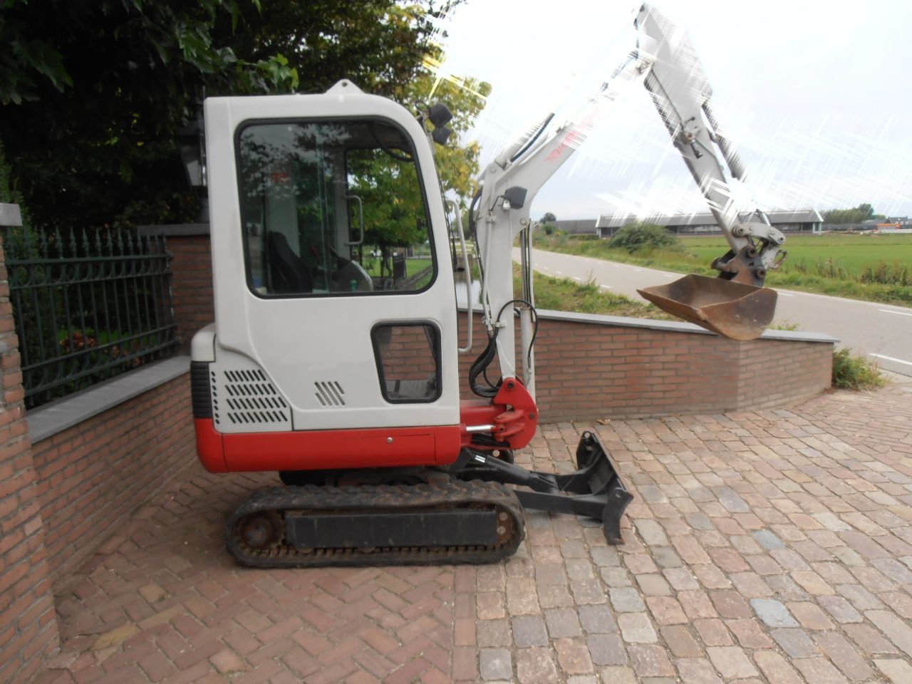 Minigraver Takeuchi Bj 2008 5060 uren zeer mooi en goed