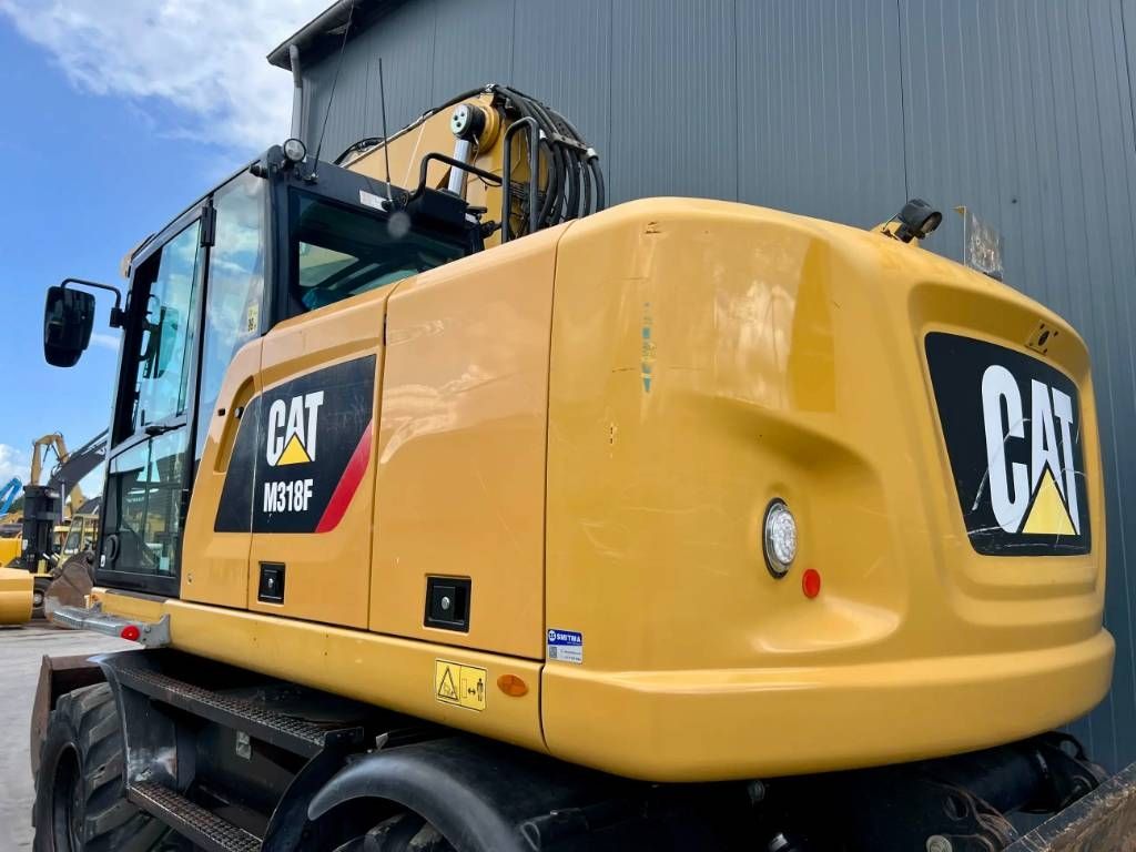 CAT M318F