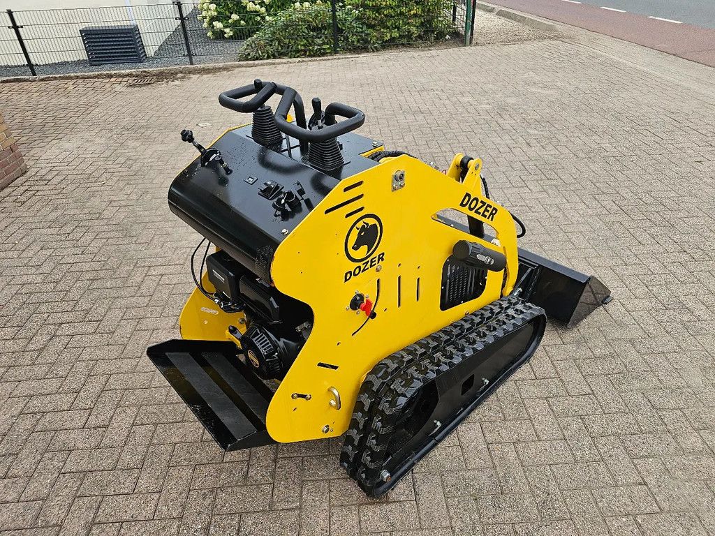 Komatsu Dozer skidsteer schranklader graafmachine