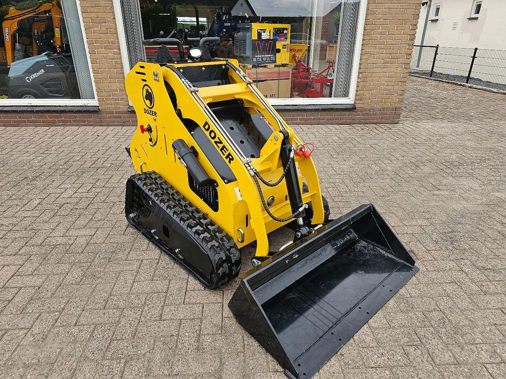 Komatsu Dozer skidsteer schranklader graafmachine