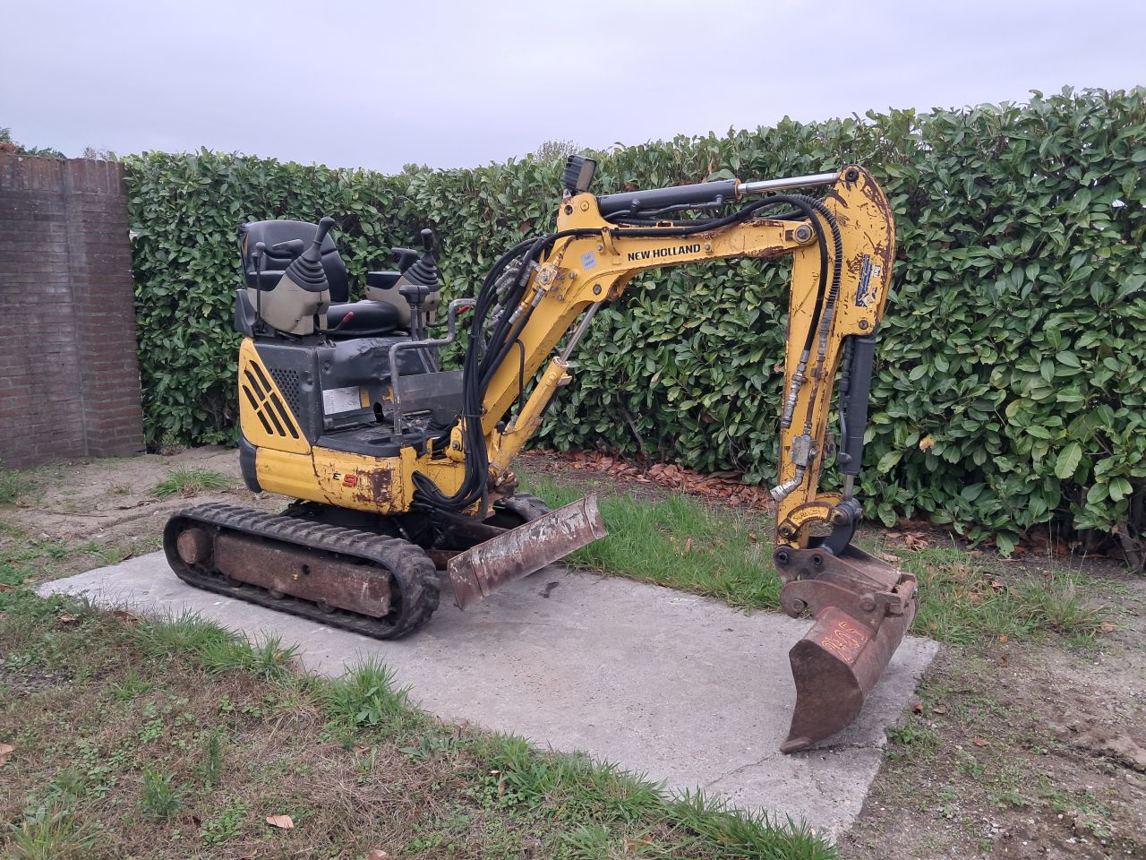 Minigraver New Holland E9 SR / Marge / Sloop- sorteer Minikraan
