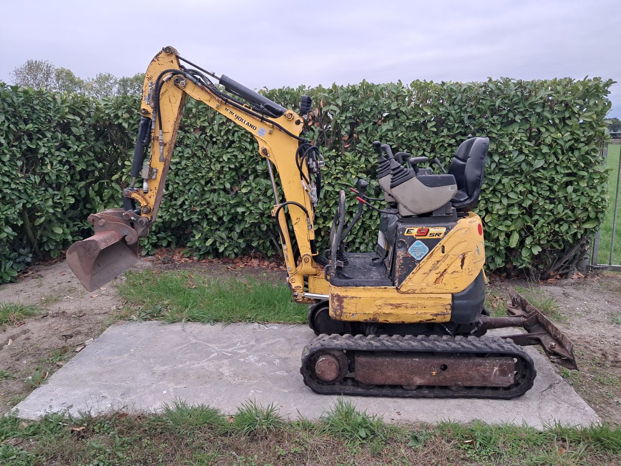 Minigraver New Holland E9 SR / Marge / Sloop- sorteer Minikraan
