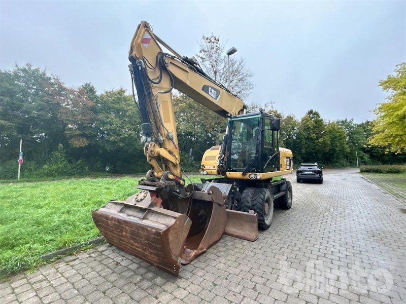 Cat M 318 D