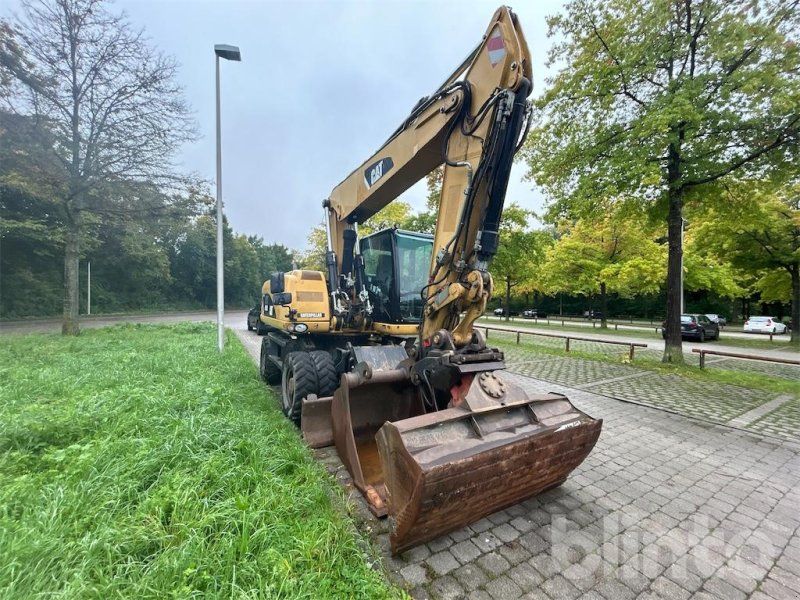 Cat M 318 D