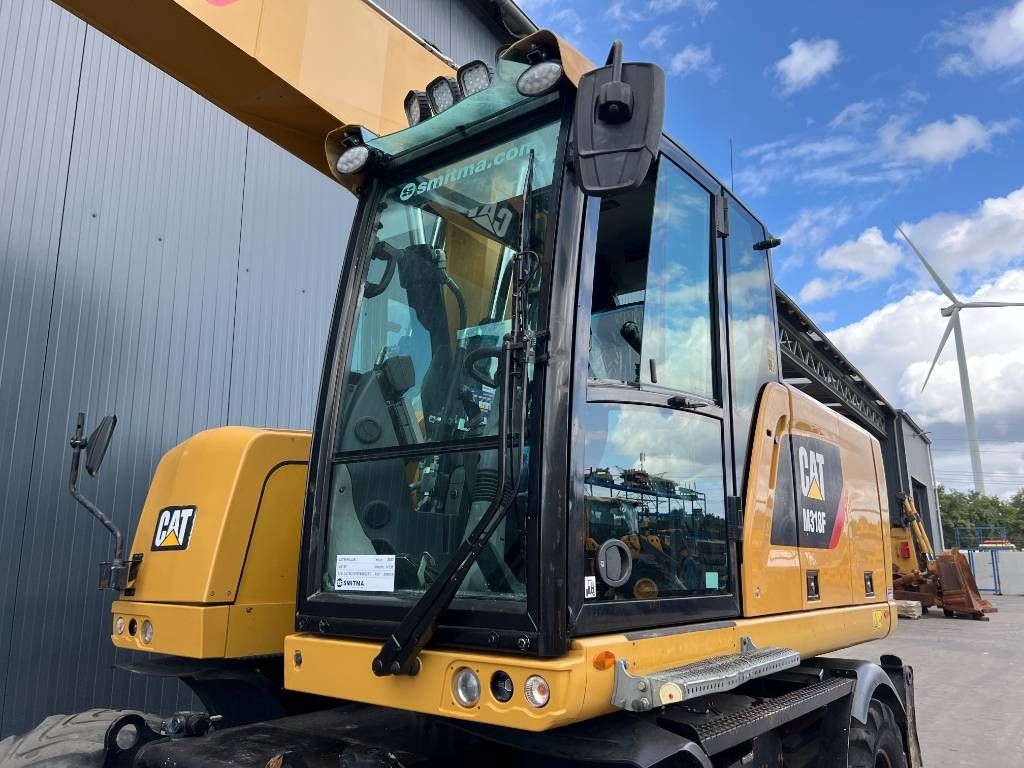 CAT M318F