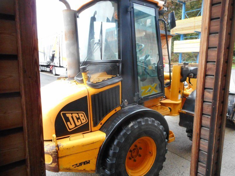 JCB 407 ( 5.400kg ) mit Schaufel + Gabel