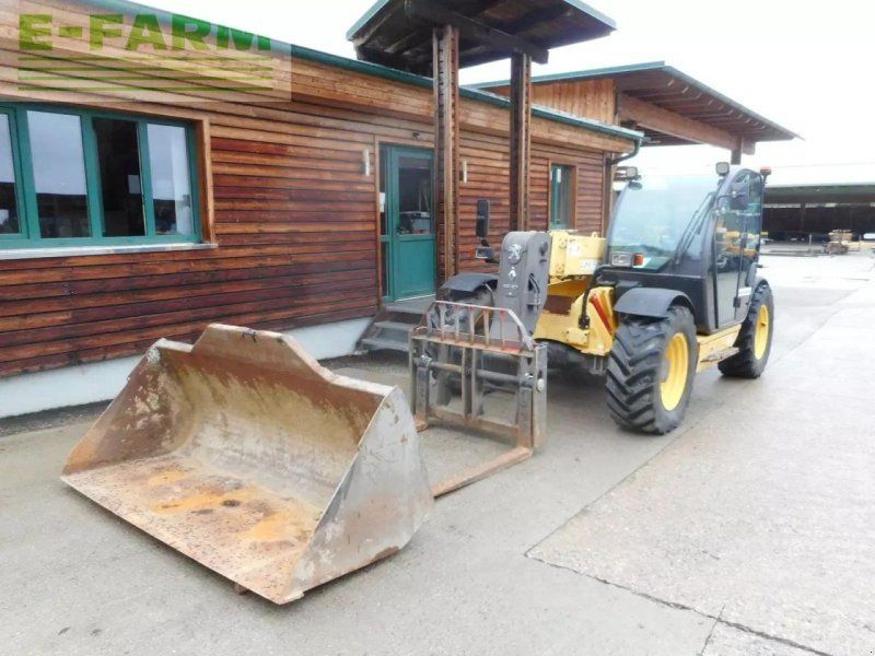 New Holland lm732 mit schaufel und gabel