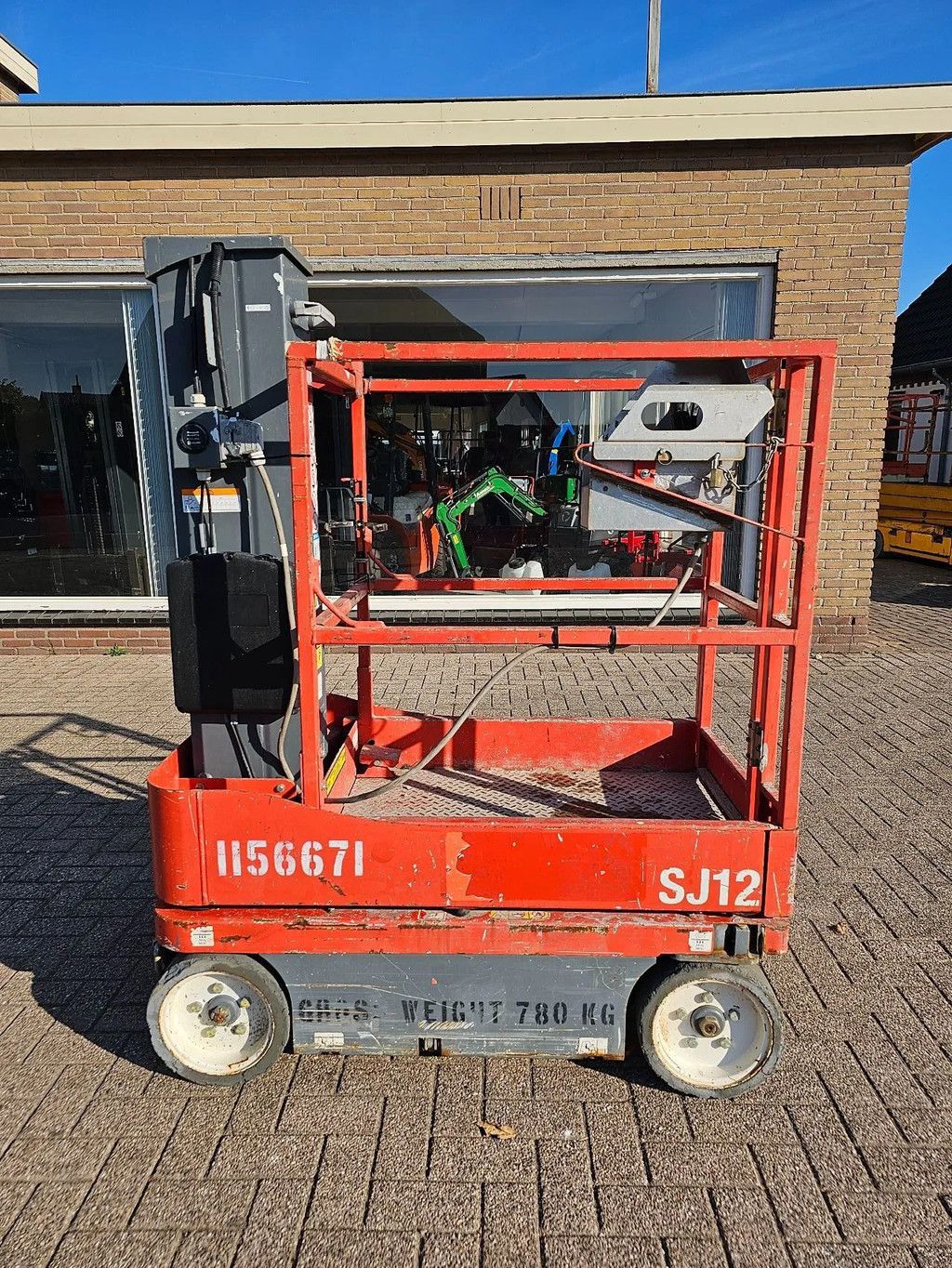 Skyjack Sj12 mast hoogwerker met boek schaarlift