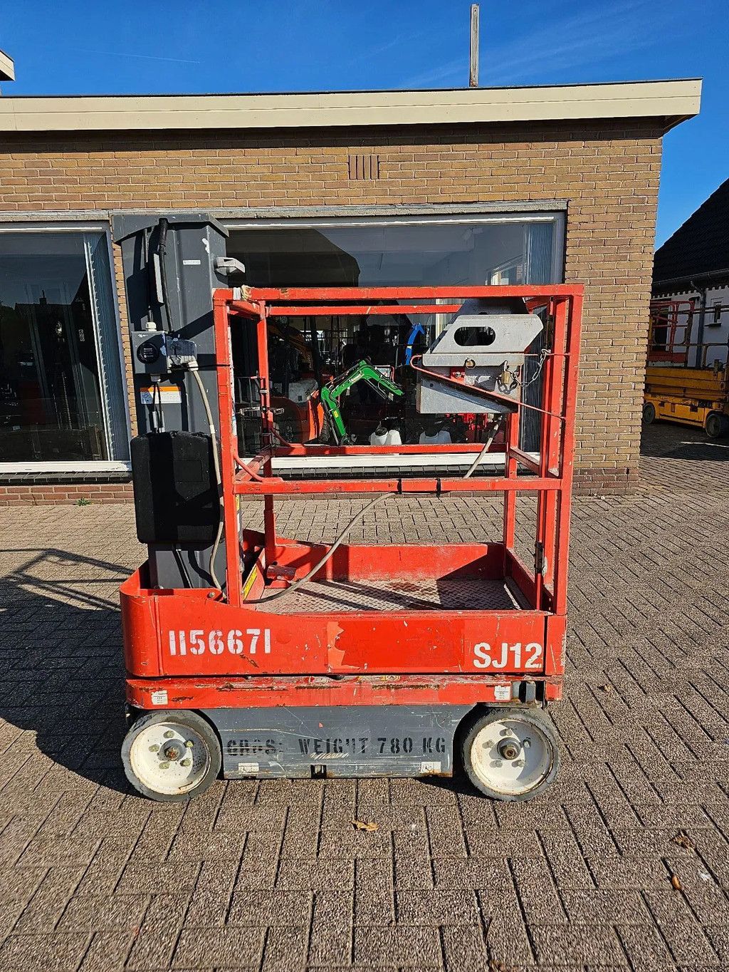 Skyjack Sj12 mast hoogwerker met boek schaarlift