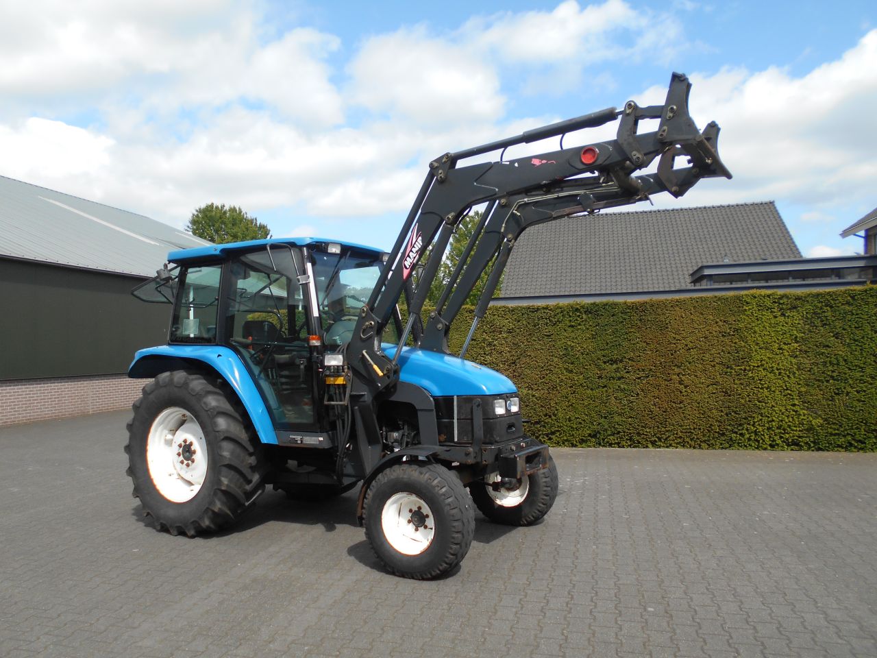 New Holland TL70 + frontlader