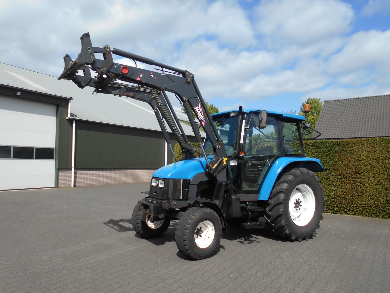 New Holland TL70 + frontlader