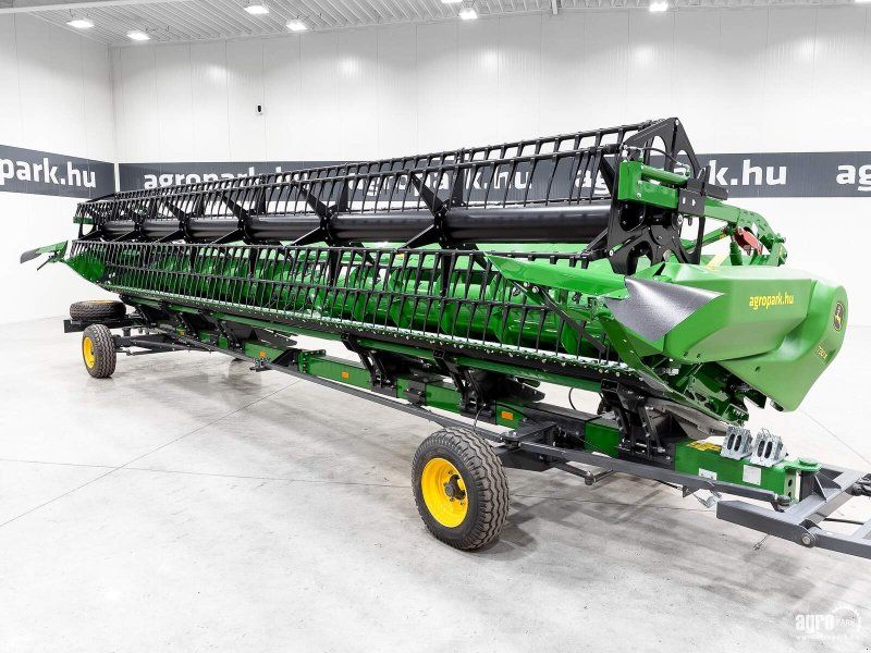 John Deere 730X 9,15 m variable depth grain header, rape side knives, trans