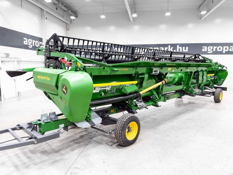 John Deere 730X 9,15 m variable depth grain header, rape side knives, trans