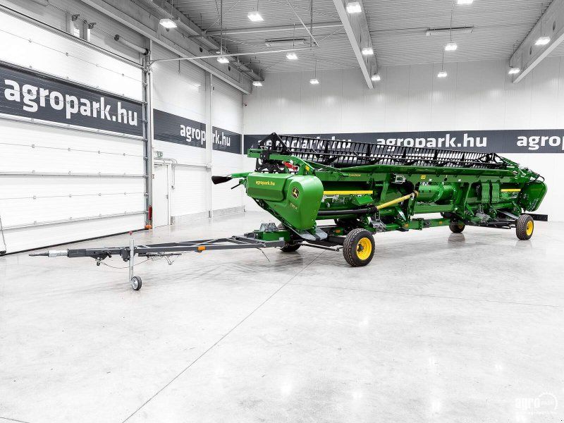 John Deere 730X 9,15 m variable depth grain header, rape side knives, trans