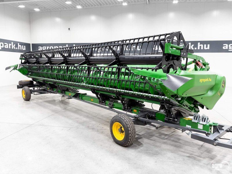 John Deere 730X 9,15 m variable depth grain header, rape side knives, trans