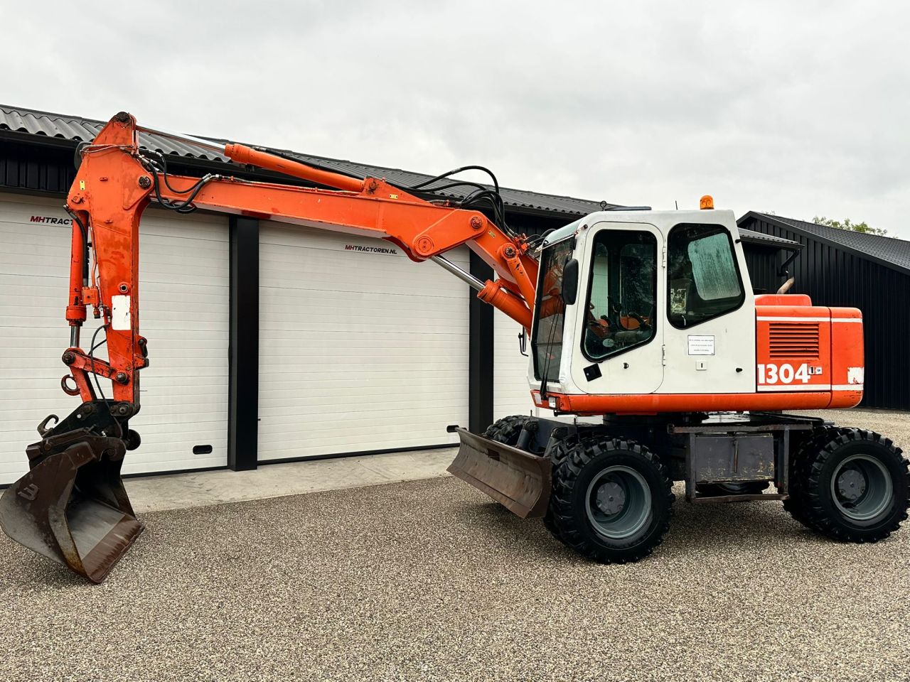 TE KOOP: zeer nette ATLAS 1304 mobiele kraan