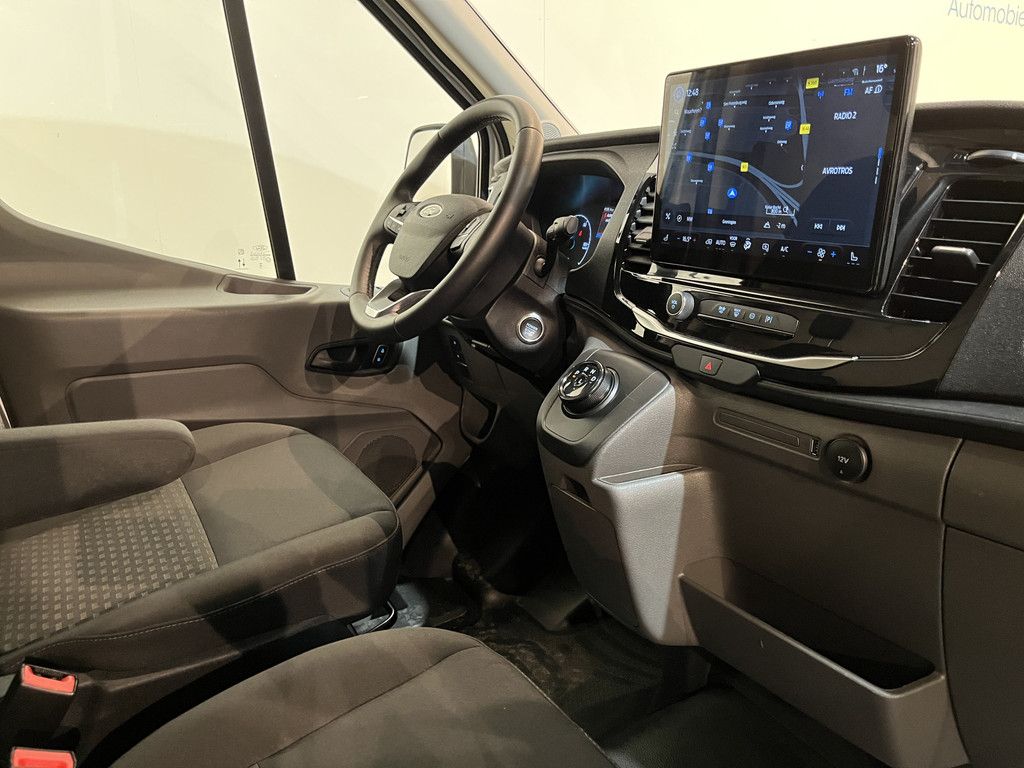 Ford E-Transit L2H2 Trend 68 kWh 184 PK / 100% Elektrisch !! / Airco / Cruise Control / CarPlay / Camera / Navigatie / 3-Zits / 15.500 KM !!