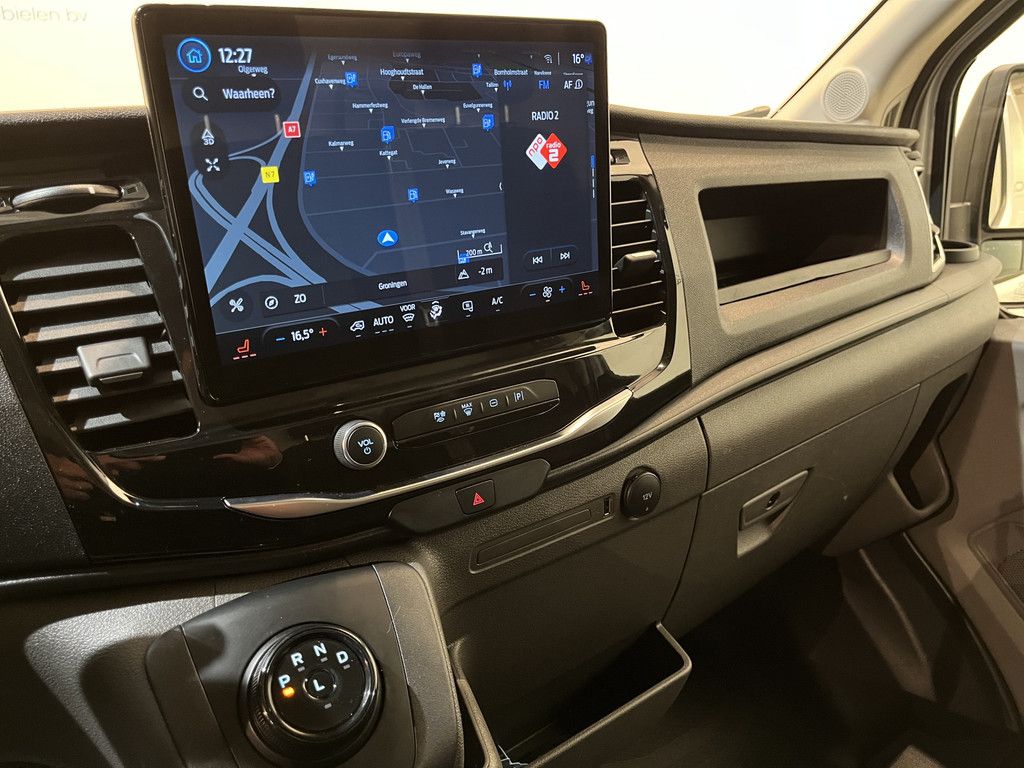 Ford E-Transit L2H2 Trend 68 kWh 184 PK / 100% Elektrisch !! / Airco / Cruise Control / CarPlay / Camera / Navigatie / 3-Zits / 15.500 KM !!