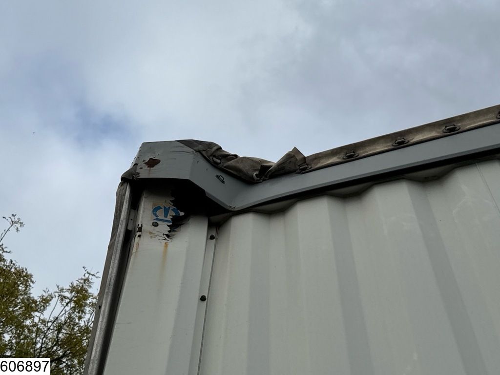 Krone Tautliner The roof and end wall are damaged.
