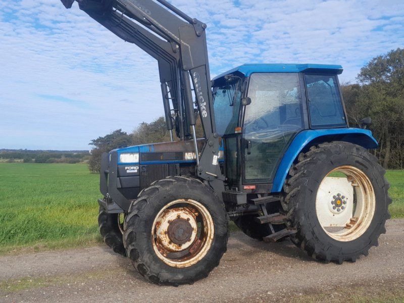 New Holland 7740 SL DP med Ålø 950 frontlæsser  7740 4WD SL DP