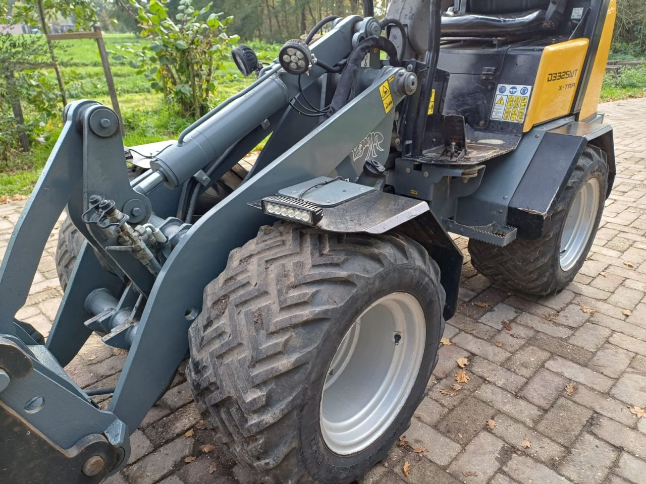 Ginat D332 SWT X-tr | bj 2015 | 2830uur |Bak en lepels