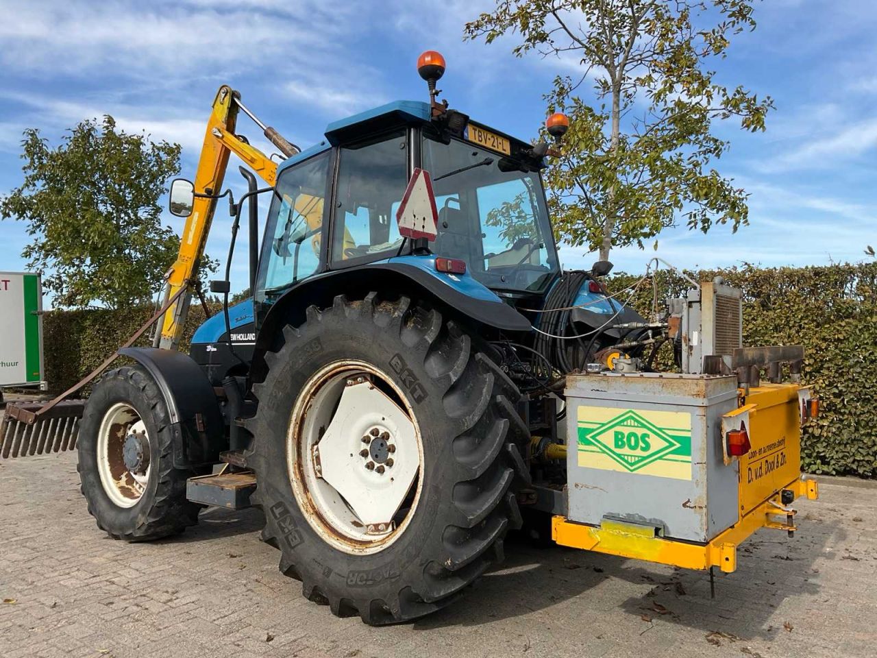 New Holland TS 100 + bos slootarm
