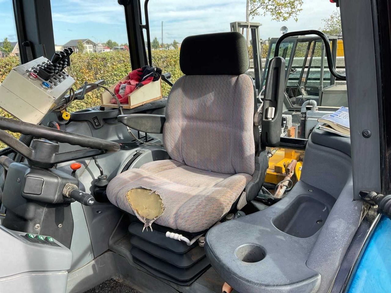 New Holland TS 100 + bos slootarm
