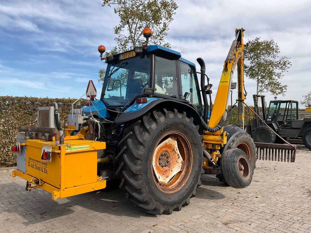 New Holland TS 100 + bos slootarm