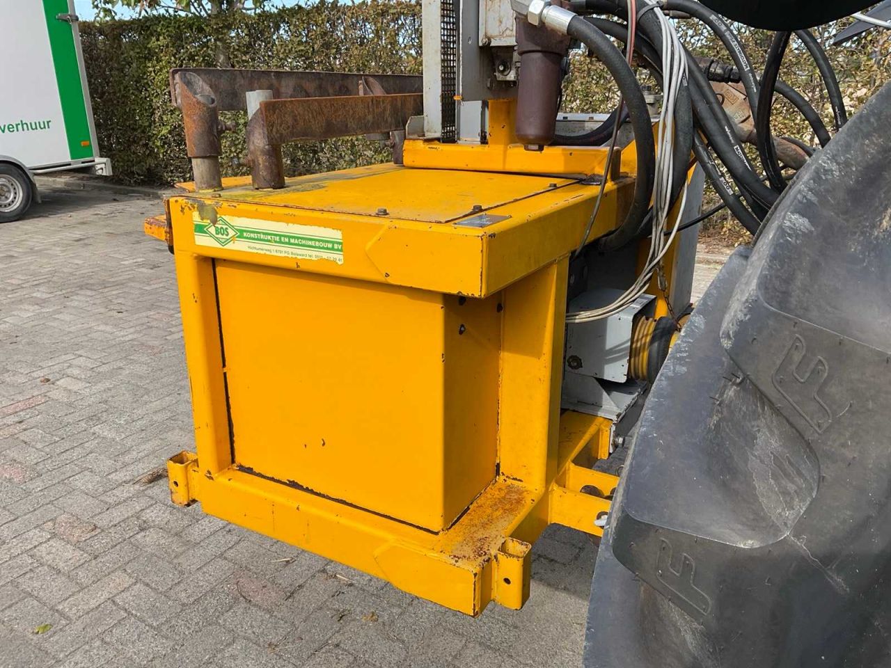 New Holland TS 100 + bos slootarm