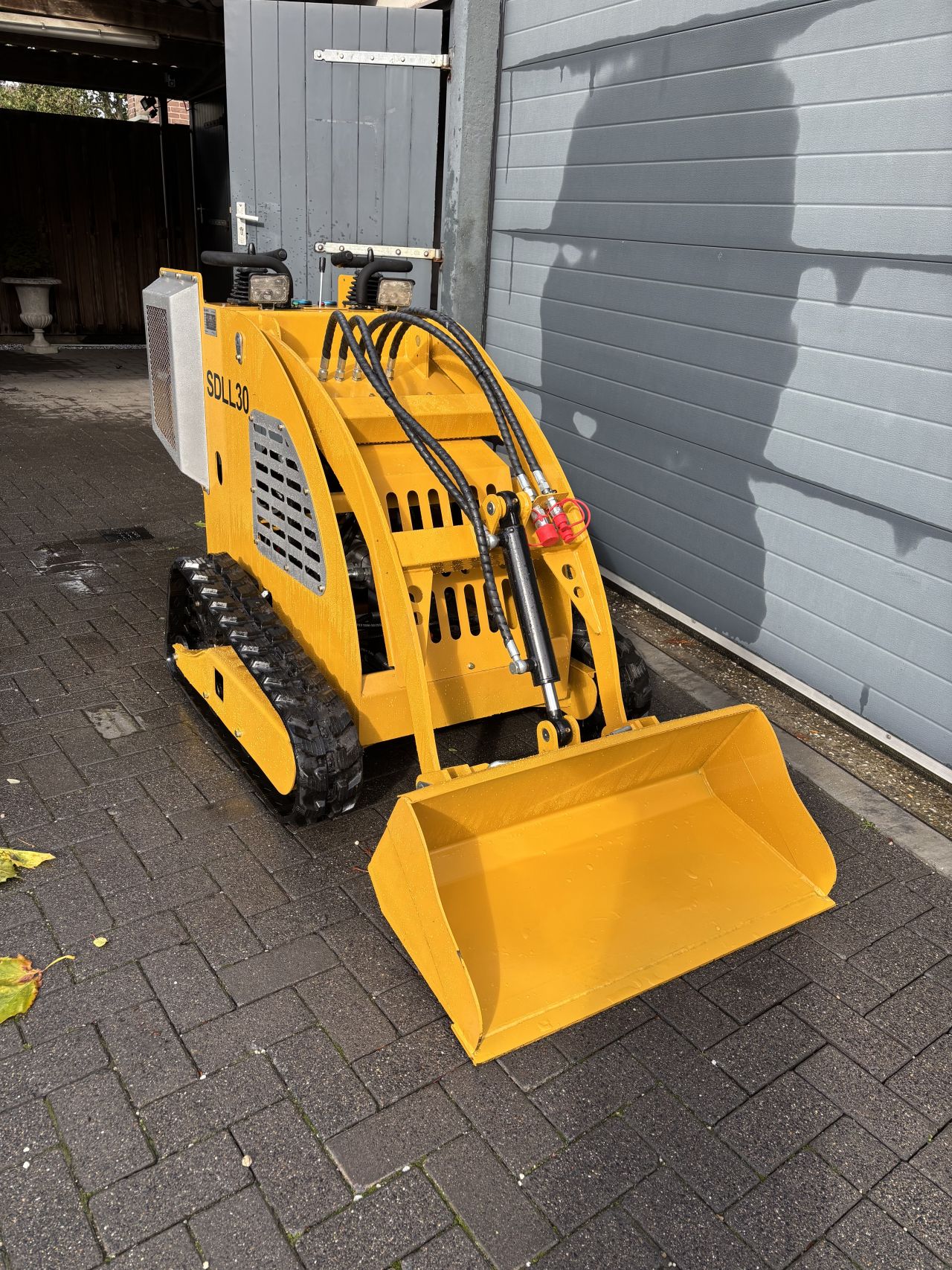 Schranklader skidster minishovel sherpha
