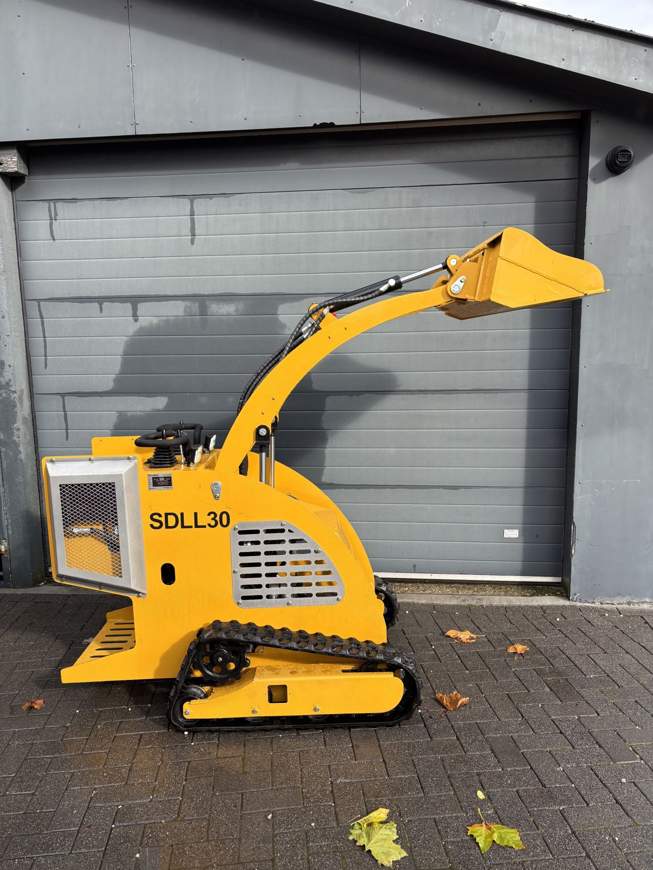 Schranklader skidster minishovel sherpha