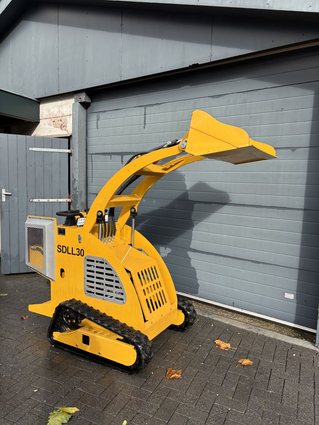 Schranklader skidster minishovel sherpha