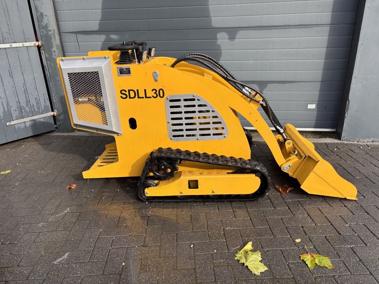 Schranklader skidster minishovel sherpha